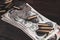 Old west period US banknotes and silver certificates with silver dollar coins and .45 caliber revolver ammunitions