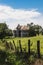 Old white abandoned farm house in East Tennessee