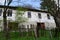 Old white abandoned house