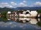 Old white building in the background of a lake in Hongcun village, China