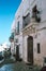 Old White Building with Balcony in Ostuni, Italy