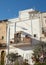 Old White Building with Balcony in Ostuni, Italy