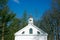 Old white church and steeple in Allaire Park New Jersey