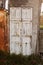 Old white colored door in abandoned house