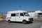 Old white Fiat Ducato van parked on the street.