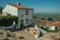 Old white house with countryside landscape