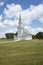 Old white wooden church on the prairie