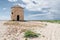 Old windmill on the beach