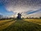 Old windmill with a beautiful sky and clouds