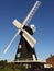 Old windmill in Kent - Black with white sails