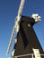 Old windmill in Kent - Black with white sails