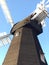 Old windmill in Kent - Black with white sails