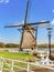 Old windmill beside lake Rottemeren near rotterdam