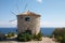 Old windmill near of Mediterranean sea