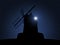 Old windmill on the night sky background