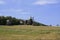 Old windmill. Ukrainian mill of the nineteenth century. Summer landscape, sunshine. Village Pirogovo