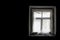 Old window in dark and cobweb