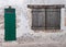 Old window and door with wooden shutters