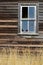 Old window on a wood barn in North dakota countryside