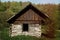 Old window and wooden cottage, aged cottage, traveling in sunny