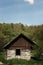 Old window and wooden cottage, aged cottage, traveling in sunny