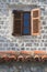 Old window with wooden shutters close up vertical