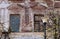 Old windows in a brick building close-up. A window in an abandoned building. Ruined architecture