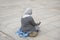 Old woman beggar sitting begging money from people