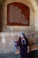 Old woman and Haci Bektas Veli Mosque