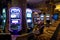 Old woman playing slot machines in Las Vegas Casino