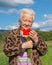 Old woman with poppies