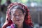 Old woman on street food market near Inle lake, Myanmar, Burma, close up