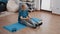 Old woman stretching arms and legs with resistance band