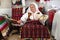 An old woman weaver spun wool on her hand