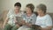 Old women holding the digital tablets