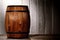 Old Wood Antique Whisky Barrel in Aged Warehouse