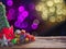 Old wood board And decorations in the space available for placing objects. Background bokeh bubbles colorful. Christmas and New Ye