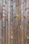 Old wood climbing wall with toe and hand hold studs.