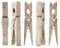 Old wood clothespins on isolated white background