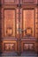 Old wood door on Peles museum, Sinaia Romania