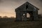 Old wood farm shed on a foggy night