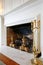 Old wood fireplace with white mental.