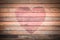 Old wood heart background.