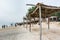 Old wood houses and boats in the Heritage folk village in the beach of Abu Dhabi, United Arab Emirates