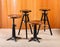 Old wood and iron revolving stools