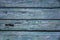 Old wood painted planks horizontal dirty blue
