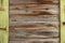 Old wood planks frame. Vintage colored abandoned fence planks backdrop.