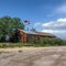 Old wood ranch with American flag in the desert