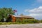 Old wood ranch with American flag in the desert