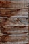 Old wood texture. Board of old natural wood with knots cracks and scuffs. Brown wooden vintage background. Parquet dies